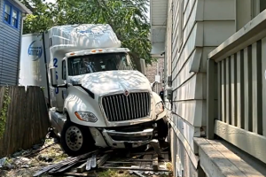 Driverless Semi Barrels Through Neighborhood